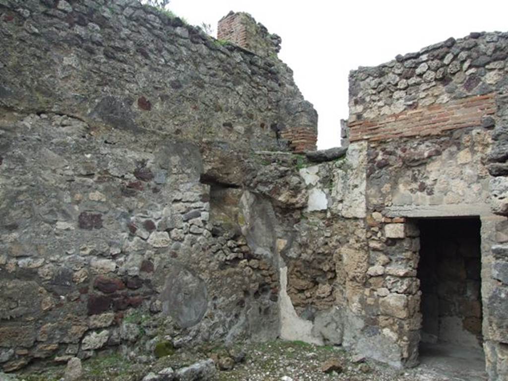 VI.10.7 Pompeii.  March 2009.  Room 14.  West and north walls and door to room 13.