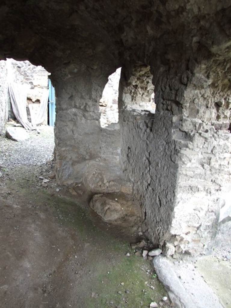 VI.10.7 Pompeii. March 2009. West corridor, with remains of structure at north end.