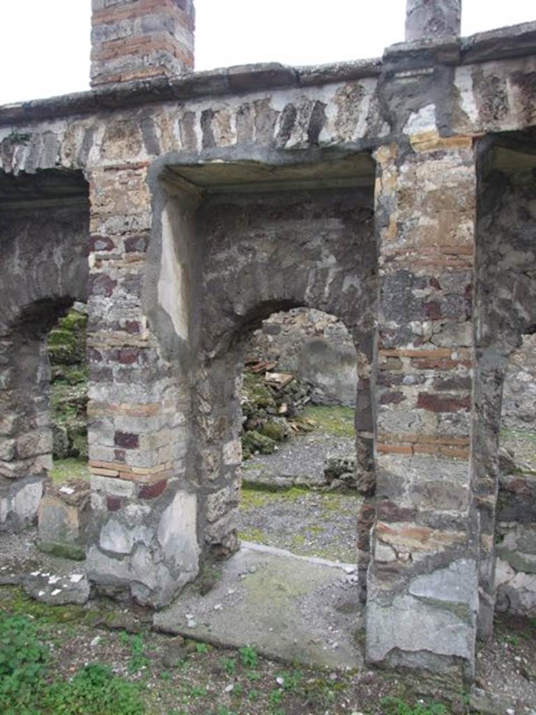 VI.10.7 Pompeii. March 2009. Room 15, west side of garden area with doorway at south end leading to west corridor.