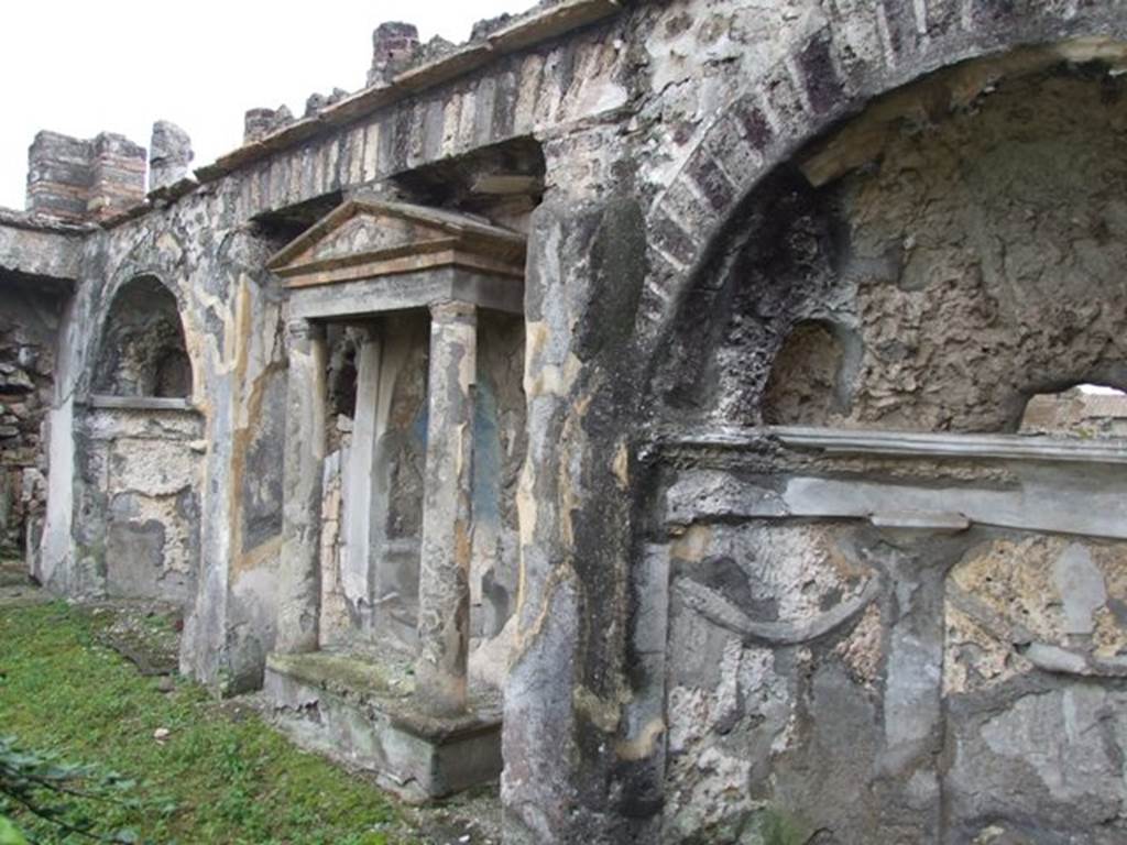 VI.10.7 Pompeii. March 2009. Room 15, south side of garden area, with three mosaic niches.  