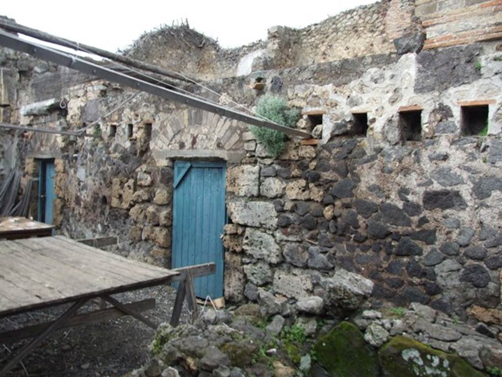 VI.10.7 Pompeii. March 2009. Room 16, north wall, with two doorways below room 9, on left, and room 10, in centre, belonging to the floor above.