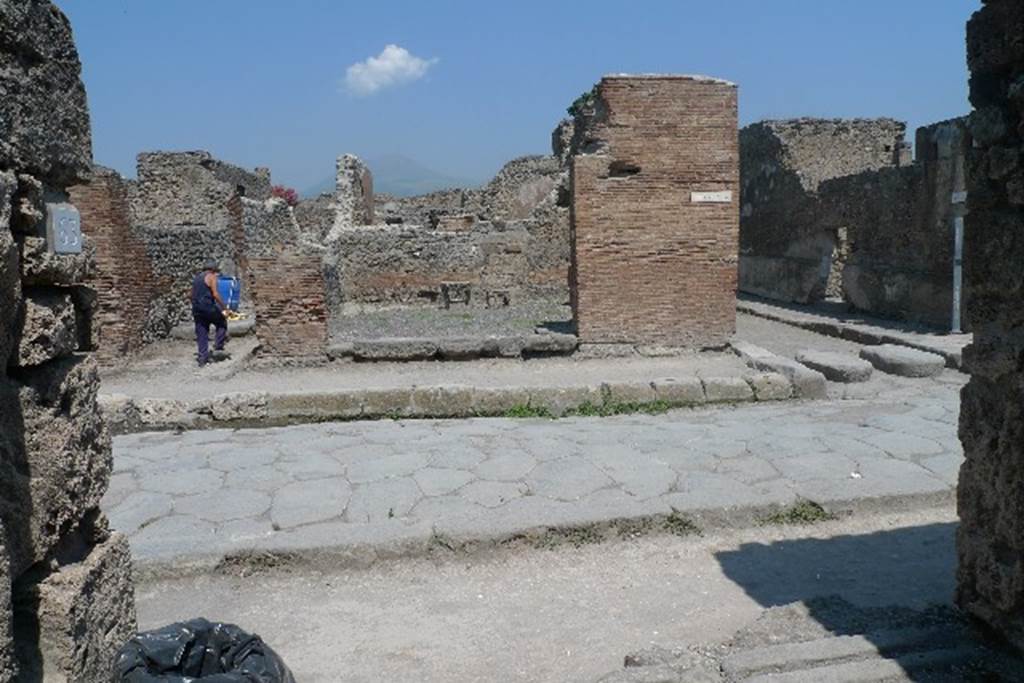 VI.10.15 Pompeii. July 2010. Looking north across Via della Fortuna towards entrance doorway. Photo courtesy of Michael Binns.