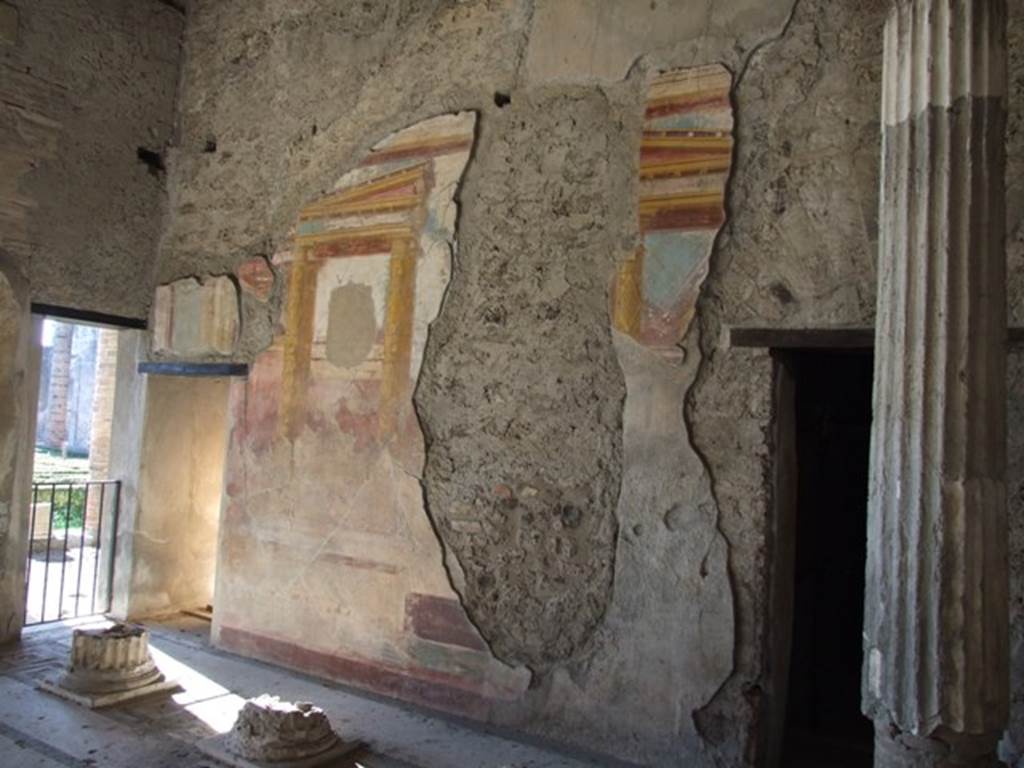 VI.11.10 Pompeii. December 2007. Room 43, west wall with architectural wall painting.
Doorway to room 44 is on the right, and doorway to room 42 on the left.