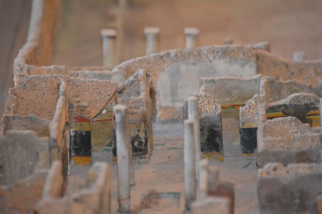 VI.11.9/10 Pompeii. July 2017. Looking south across atrium 27, towards entrance doorway, in centre.
On the left of it in the black painted atrium wall is the doorway to room 25, on the right into room 24.
From cork model in Naples Archaeological Museum.
Foto Annette Haug, ERC Grant 681269 DÉCOR.