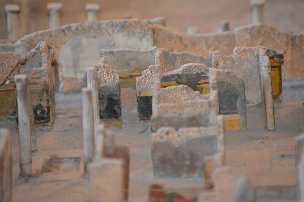 VI.11.9/10 Pompeii. July 2017. Looking south across atrium 27, towards entrance doorway, on left.
Continuing to the right in the black painted atrium wall is the doorway to room 24.
Next to that, the yellow wall would be the south wall of room 28, on its right is the south-east corner of atrium 3, (VI.11.9) also with black wall and yellow zoccolo. On the extreme right is the entrance corridor of VI.11.9.
From cork model in Naples Archaeological Museum.
Foto Annette Haug, ERC Grant 681269 DÉCOR.