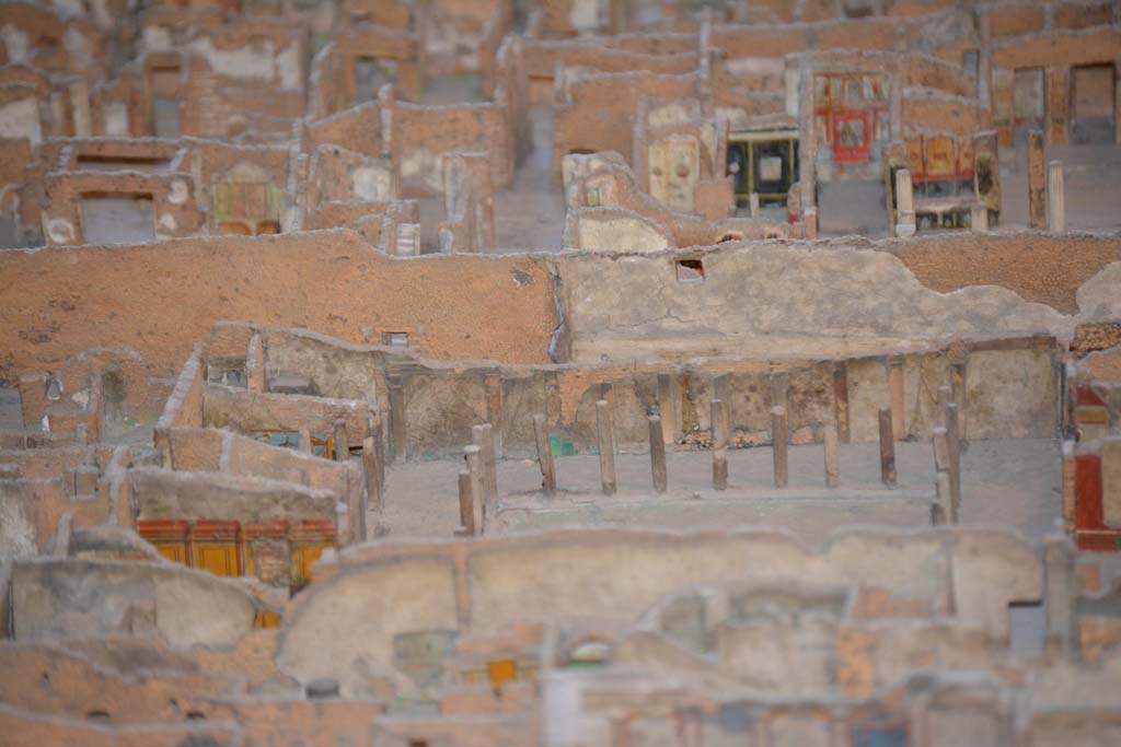 VI.11.9/10 Pompeii. July 2017.
Looking towards east wall of peristyle 36, with east walls of rooms 40, (yellow painted, lower left), 42, 43 and 46, visible on left.
From cork model in Naples Archaeological Museum.
Foto Annette Haug, ERC Grant 681269 DÉCOR.