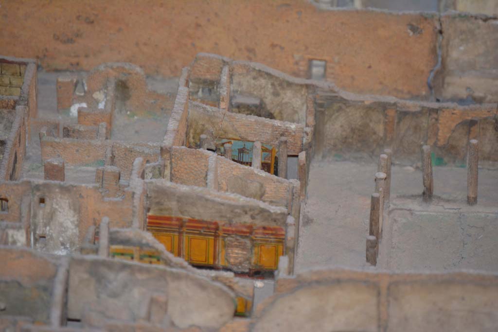 VI.11.9/10 Pompeii. July 2017.
Looking towards north portico of peristyle 36, with east walls of rooms 39, just visible, 40, (yellow painted, in centre), 42, 43 (Corinthian oecus) and 46, visible on left.
From cork model in Naples Archaeological Museum.
Foto Annette Haug, ERC Grant 681269 DÉCOR.
