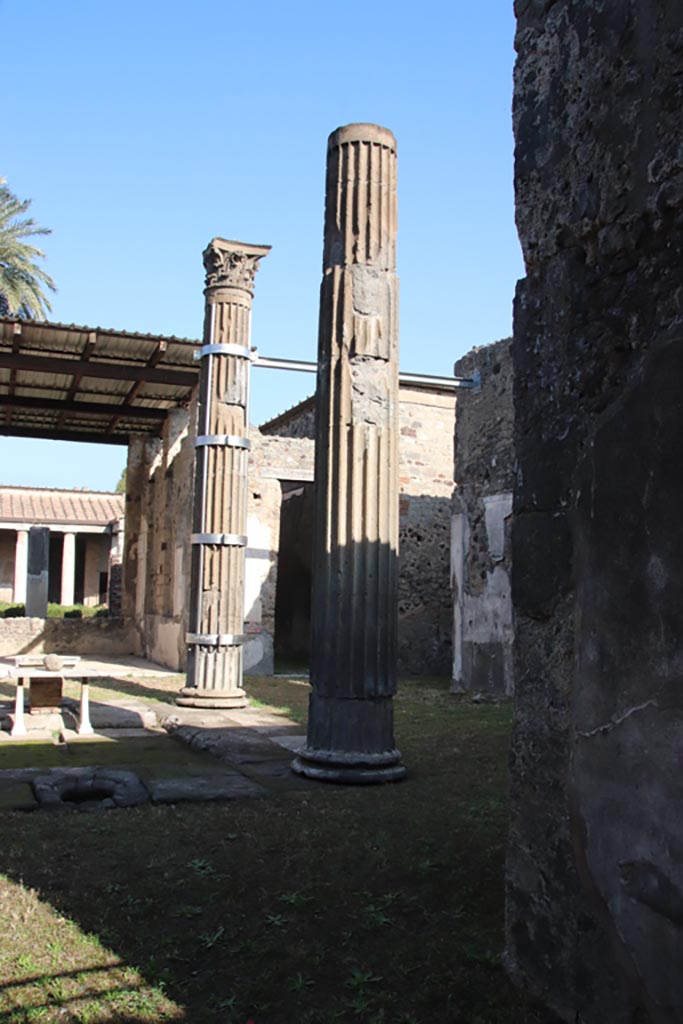 VI.11.10 Pompeii. October 2023.
Looking towards columns on east side of impluvium. Photo courtesy of Klaus Heese.