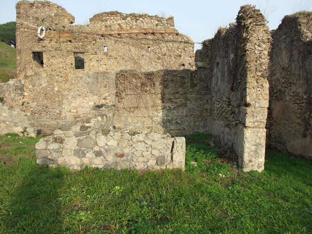 VI.11.19 Pompeii. December 2007. Doorway to cubiculum (3) on north side of entrance at VI.11.19, looking east from atrium.  
This was on the south side of shop or workshop at VI.11.20. 
