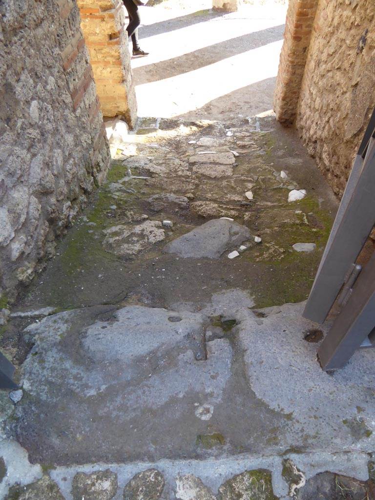 VI.12.2 Pompeii. September 2015. Looking east in small room, with remains of imprint of stairs to upper floor in plaster on north wall.