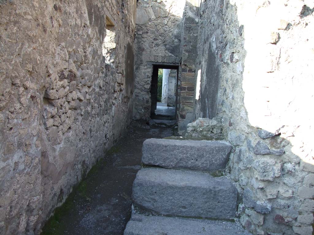 VI.12.2 Pompeii. December 2006. Corridor on east side, and stairs to upper floor. Looking north.