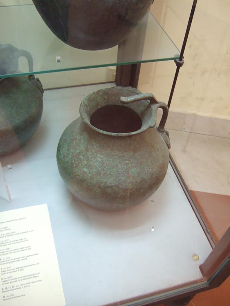 VI.12.2 Pompeii. Found on 5th November 1830. One handled bronze jug. 
Now in Naples Archaeological Museum. Inventory number 69429.
See Fiorelli G., 1862. Pompeianarum antiquitatum historia, Vol. 2: 1819 - 1860, Naples, p. 242-243.
