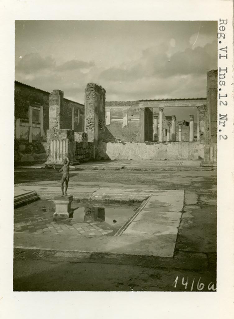 VI.12.2 Pompeii. pre-1937-39. Looking north-west across impluvium in atrium.
Photo courtesy of American Academy in Rome, Photographic Archive. Warsher collection no. 1416a.
