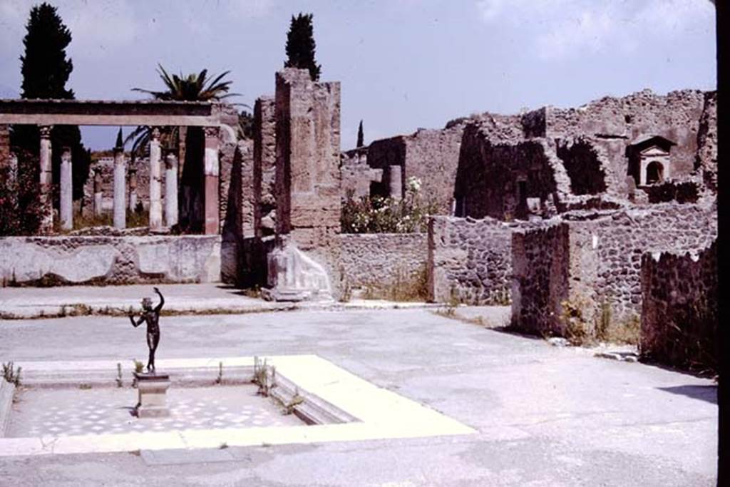 VI.12.2 Pompeii. 22nd July 1961. Looking north across east side of atrium. Photo courtesy of Rick Bauer.

