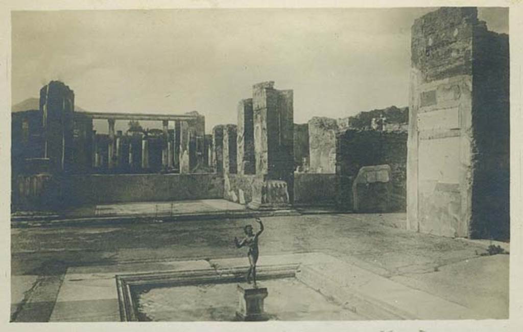 VI.12.2 Pompeii. May 1932. Atrium, looking north-east. Photo courtesy of Rick Bauer.
The east ala can be seen on the right of the photo, together with a painted wall with doorway leading towards atrium of VI.12.5. This wall is no longer there, probably because of the 1943 bombing.


