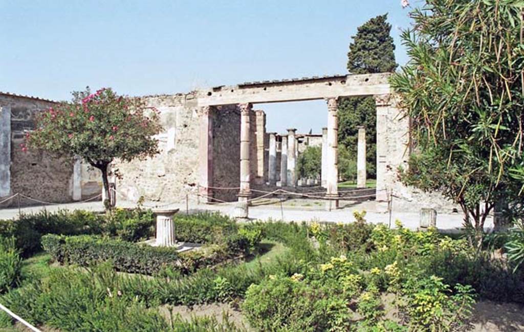VI.12.2 Pompeii. October 2001. Looking north from middle peristyle garden towards exedra, and through to rear peristyle. Photo courtesy of Peter Woods.
