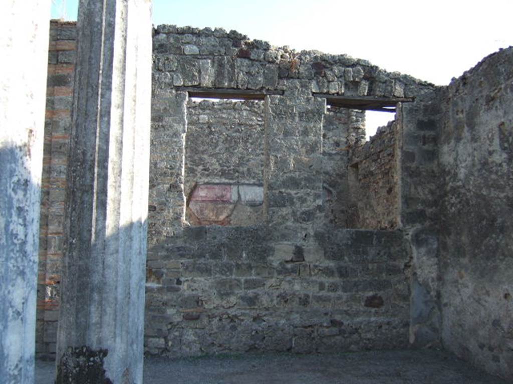 VI.12.2 Pompeii. September 2005. Looking south to room in south-west corner of rear peristyle.


