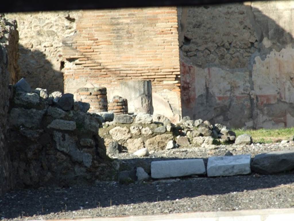 VI.13.2 Pompeii. December 2007. Looking north from tablinum into remains of peristyle on west side.