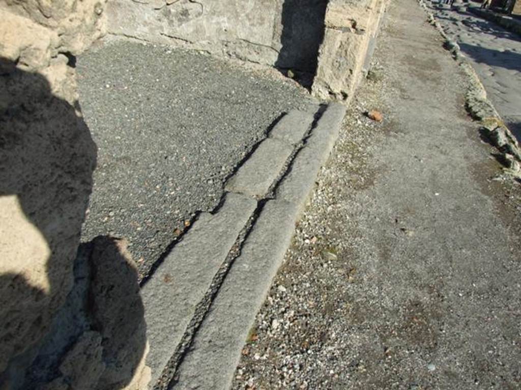 VI.14.10 Pompeii. December 2007. Front threshold or sill for sliding wooden door.