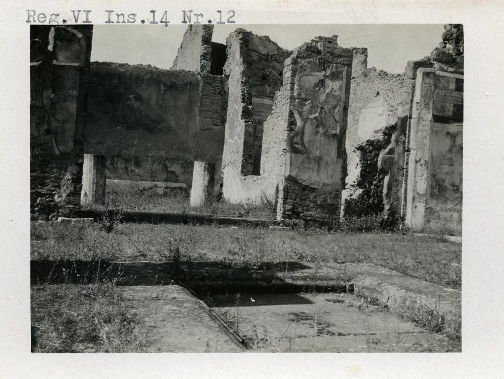 VI.14.12 Pompeii. Pre-1937-39.
Looking north-east in atrium, with garden on left, doorway to triclinium, and painted north wall of east ala, on right.
Photo courtesy of American Academy in Rome, Photographic Archive. Warsher collection no. 1835.