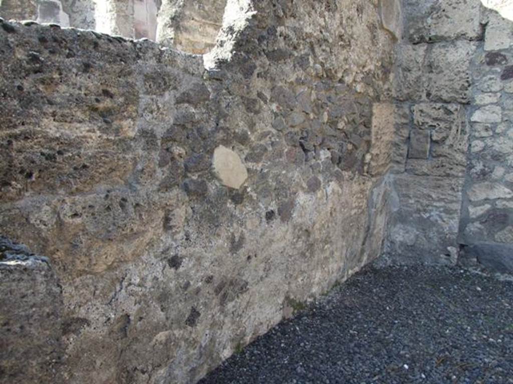 VI.14.13 Pompeii. December 2007. West wall of shop.