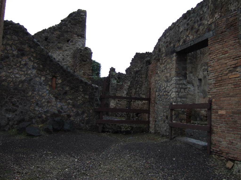 Pompeii. December 2005. Two entrance doorways at VI.14.18 and VI.14.19