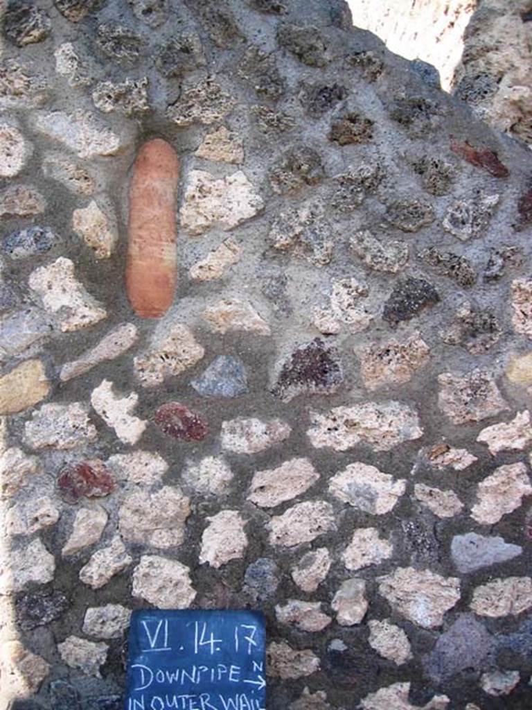 VI.14.18 Pompeii. July 2008. Downpipe in outer wall on south side of entrance doorway. Photo courtesy of Barry Hobson.