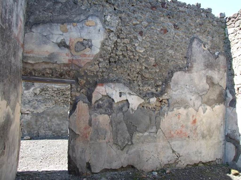 VI.14.20  Pompeii.  March 2009.  Room 7.   West wall, and with door to Ala, room 6.