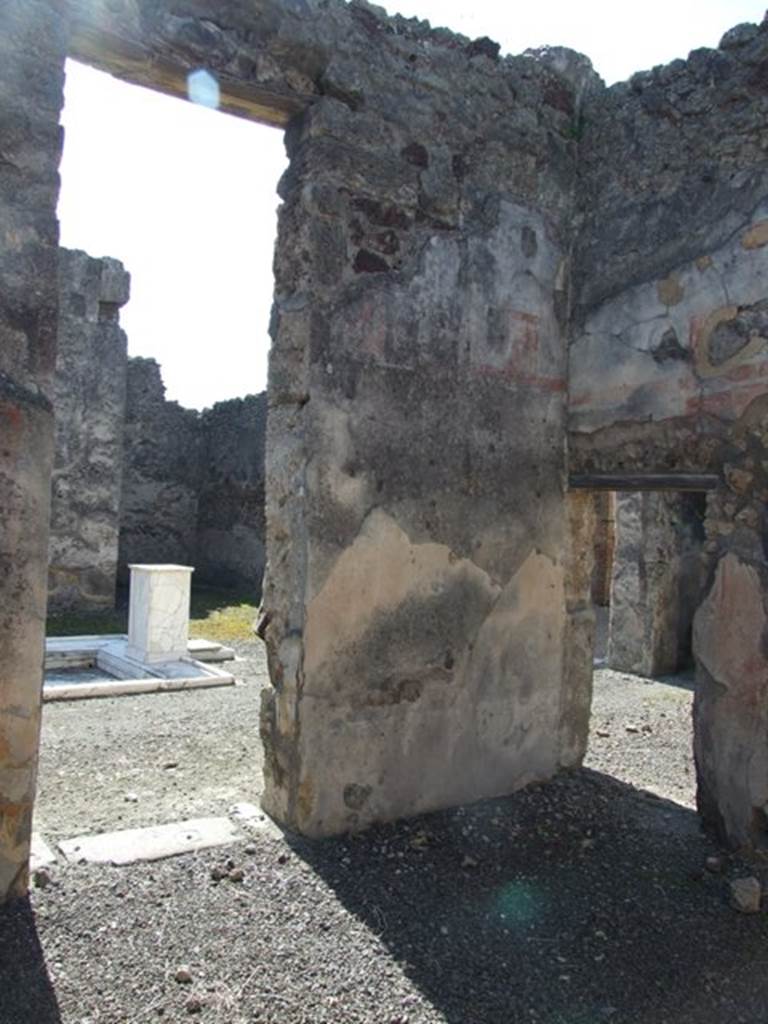 VI.14.20 Pompeii. March 2009. Room 7, south wall, with large door to atrium, and small door to room 6.