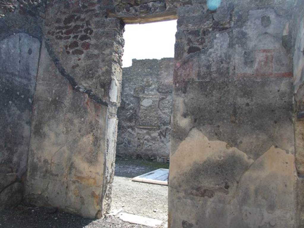 VI.14.20  Pompeii.  March 2009.  Room 7.  South wall with door to atrium.