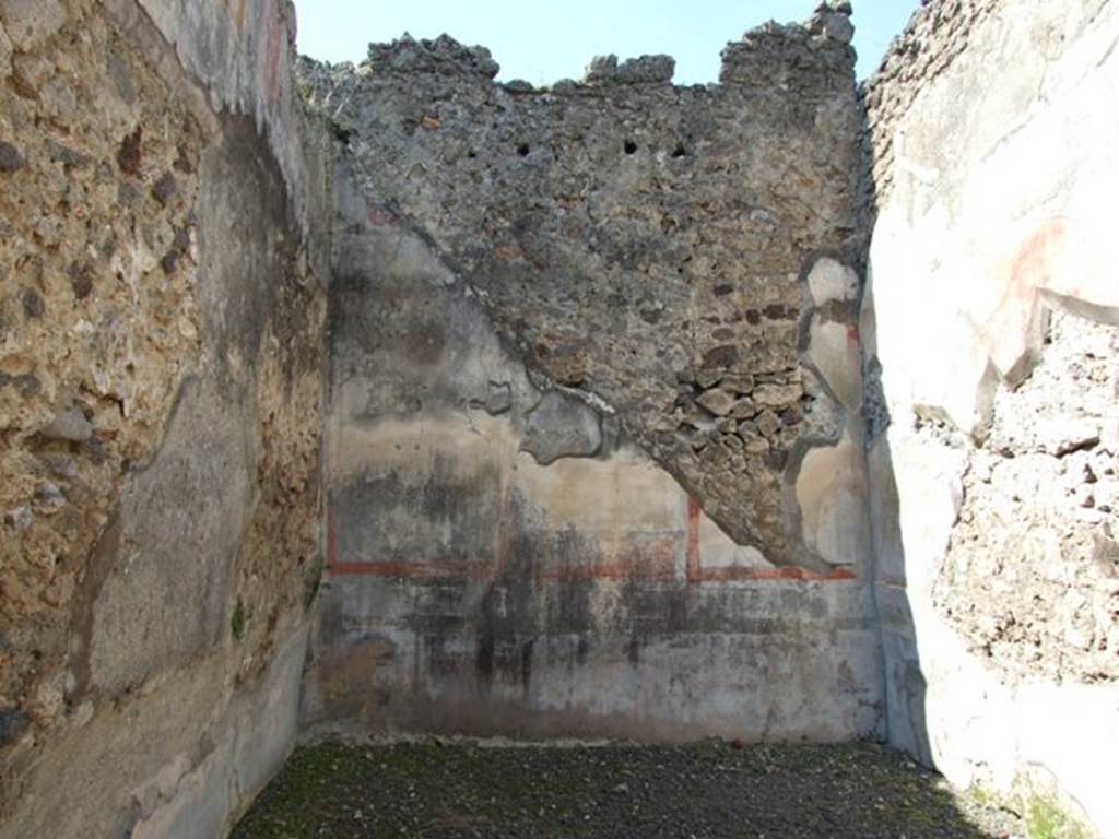 VI.14.20 Pompeii. March 2009. Room 15, west wall of triclinium with remains of painted plaster.
