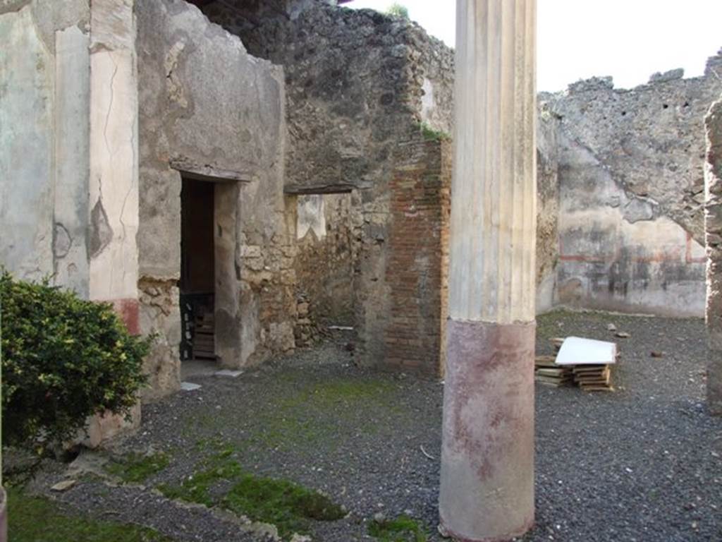 VI.14.20  Pompeii.  March 2009.   Room 16.  Portico area on west side, with doors to rooms 13, 14, and 15.

