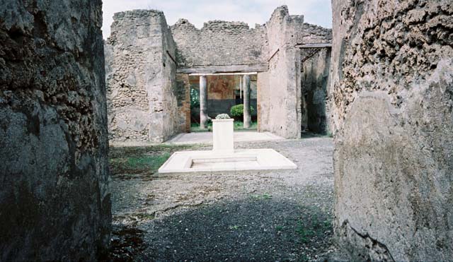 VI.14.20 Pompeii. December 2006. Looking west across atrium 1 towards tablinum 4. 