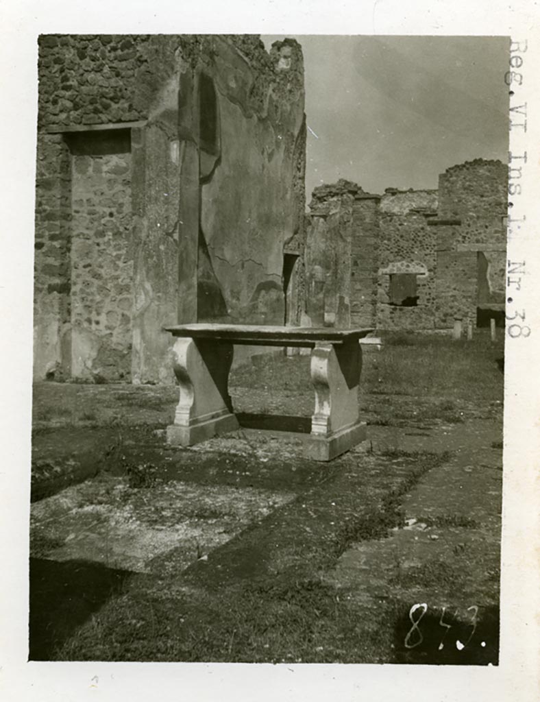 VI.14.38 Pompeii but shown as VI.1?.38 on photo. Pre-1937-39.
Looking north-east across impluvium and marble table in atrium, across tablinum to peristyle area.
Photo courtesy of American Academy in Rome, Photographic Archive. Warsher collection no. 843.