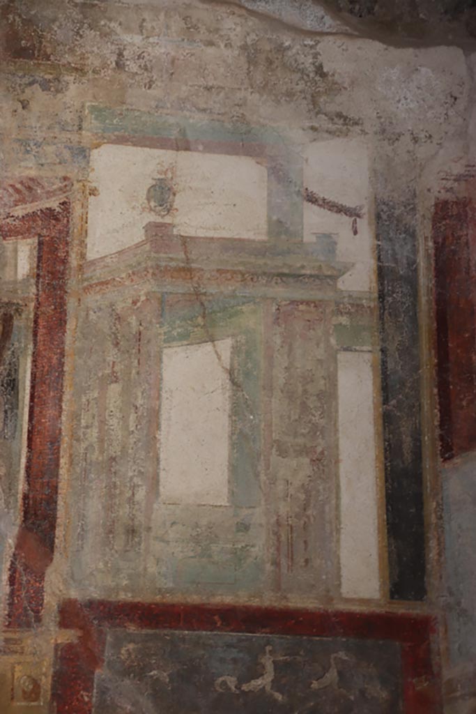 VI.15.1 Pompeii. October 2023. 
Upper east wall of exedra, continuation southwards from central panel. Photo courtesy of Klaus Heese.
