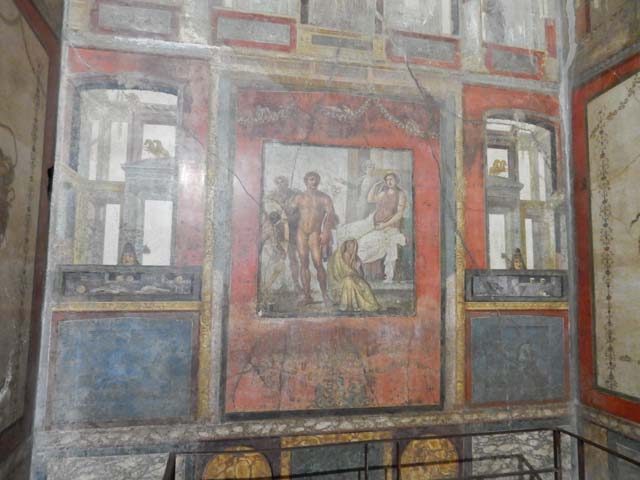 VI.15.1 Pompeii. May 2017. Central painting from south wall showing Bacchus watching over the sleeping Ariadne after she was abandoned by Theseus.
Bacchus and his attendant Maenads and Satyrs can be seen in the top, left hand side, faintly conserved.  Theseus sailing away on his boat would have been seen in the upper centre of the painting. Photo courtesy of Buzz Ferebee.

