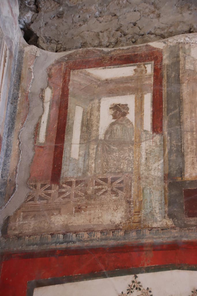 VI.15.1 Pompeii. October 2023. 
Painted figure from upper south wall in the south-east corner. Photo courtesy of Klaus Heese.
