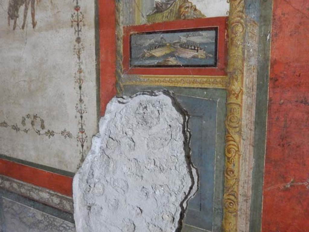 VI.15.1 Pompeii. May 2017. Panel with naval scene on east side of central painting on south wall of exedra.  Photo courtesy of Buzz Ferebee.
