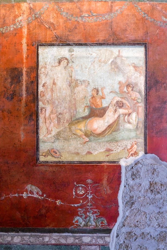VI.15.1 Pompeii. March 2023. 
Central painting on south wall - Bacchus watching over the sleeping Ariadne after she was abandoned by Theseus.
Photo courtesy of Johannes Eber.
