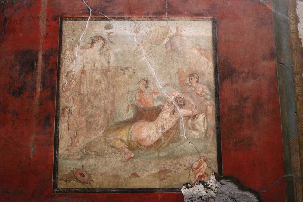 VI.15.1 Pompeii. December 2018. 
Central painting from south wall showing Bacchus watching over the sleeping Ariadne after she was abandoned by Theseus.
Photo courtesy of Aude Durand.
Kuivalainen comments –
“The positions and places of the protagonists differ, as do the reactions of the onlookers, otherwise very much as the many other wall paintings depicting this subject. The horizontal line is exceptionally high.”
See Kuivalainen, I., 2021. The Portrayal of Pompeian Bacchus. Commentationes Humanarum Litterarum 140. Helsinki: Finnish Society of Sciences and Letters, (p.147, E9).

