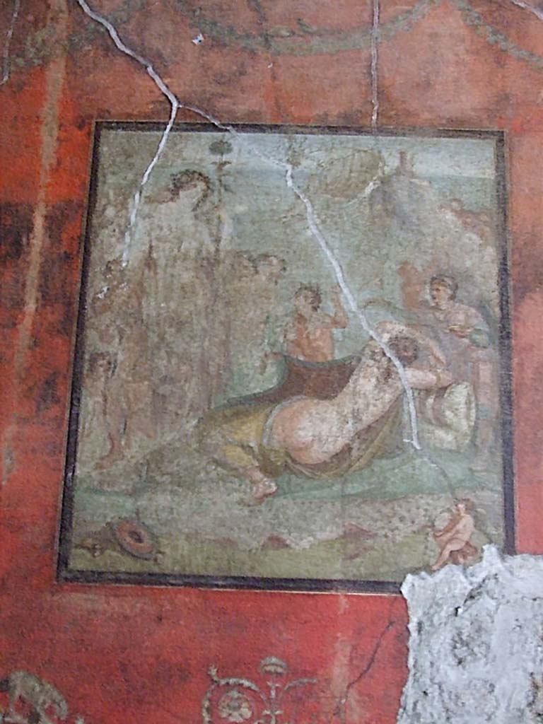 VI.15.1 Pompeii. December 2006. South wall of exedra. 
Wall painting of Bacchus watching over the sleeping Ariadne after she was abandoned by Theseus.
Bacchus and his attendant Maenads and Satyrs can be seen in the top, left hand side, faintly conserved. 
Theseus sailing away on his boat would have been seen in the upper centre of the painting.

