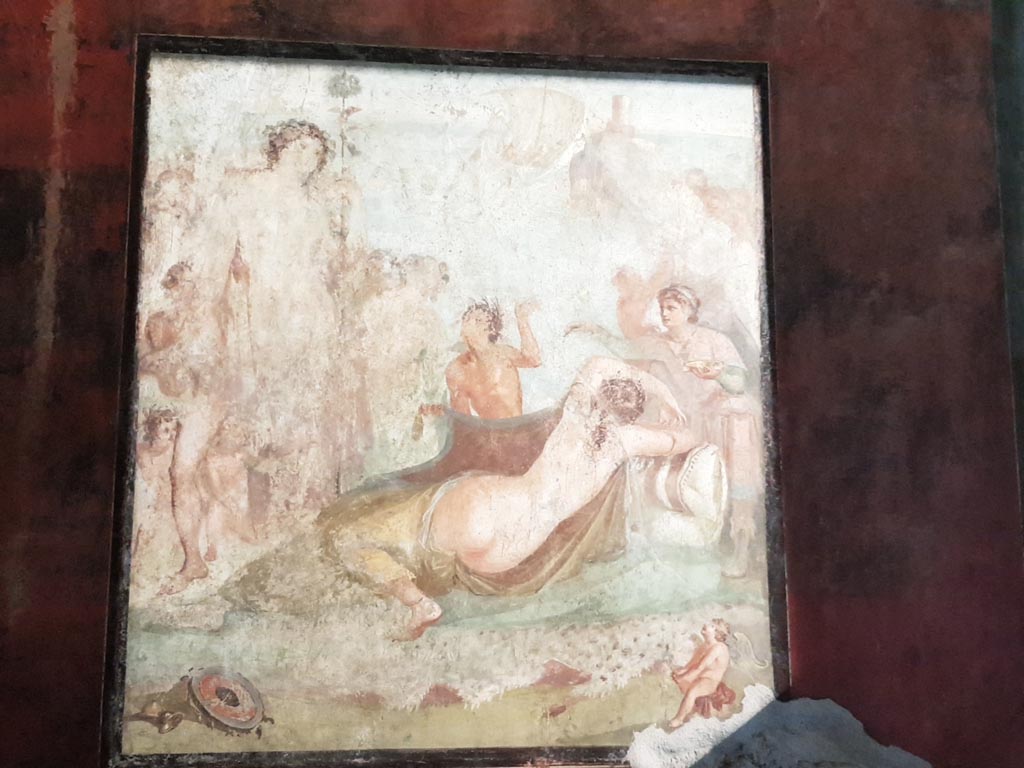 VI.15.1 Pompeii. January 2023. 
Central wall painting from south wall of Bacchus watching over the sleeping Ariadne after she was abandoned by Theseus. 
Photo courtesy of Miriam Colomer.


