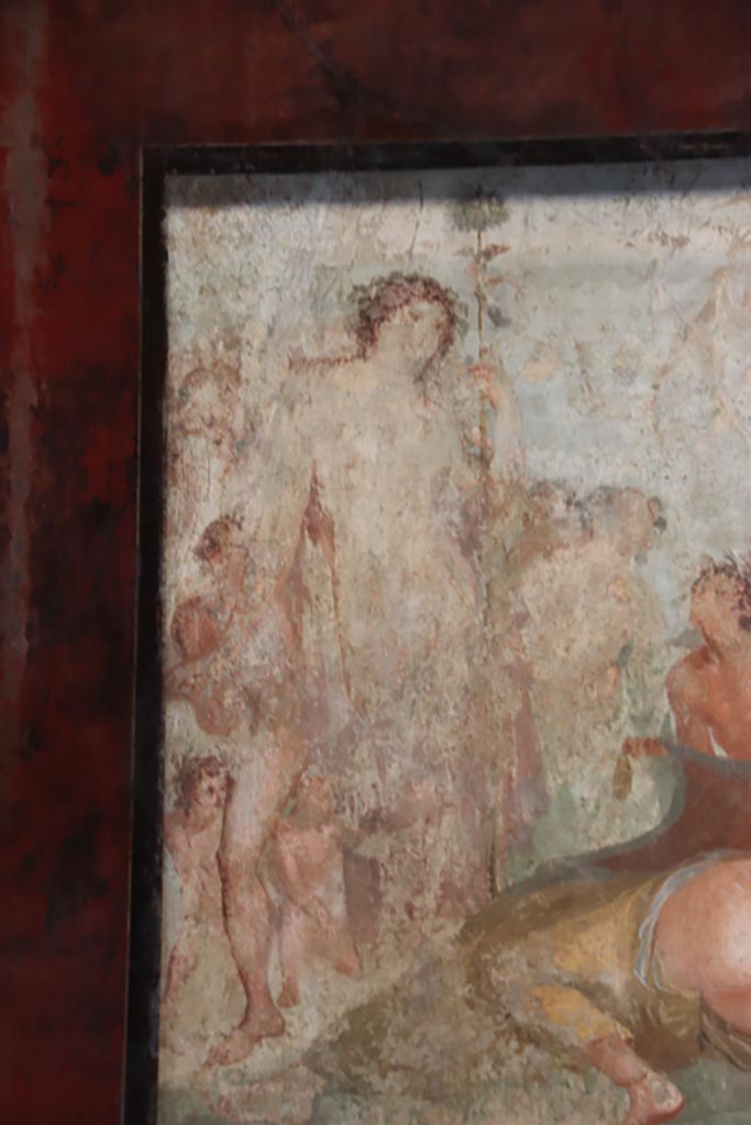 VI.15.1 Pompeii. October 2023. 
Detail from central wall painting from south wall of Bacchus watching over the sleeping Ariadne. 
Photo courtesy of Klaus Heese.

