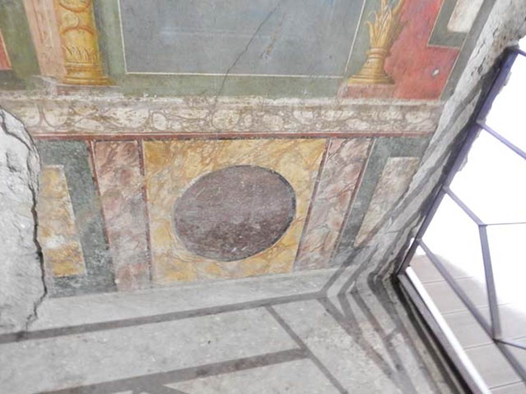 VI.15.1 Pompeii. May 2017. Painted lower panel (zoccolo) of west end of south wall
Photo courtesy of Buzz Ferebee.


