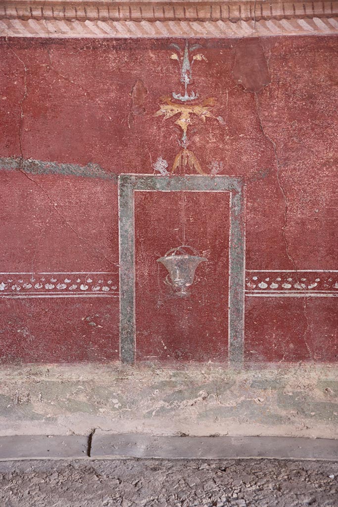 VI.15.1 Pompeii. October 2024. 
Detail of zoccolo from west end of lower south wall in exedra. Photo courtesy of Klaus Heese.
