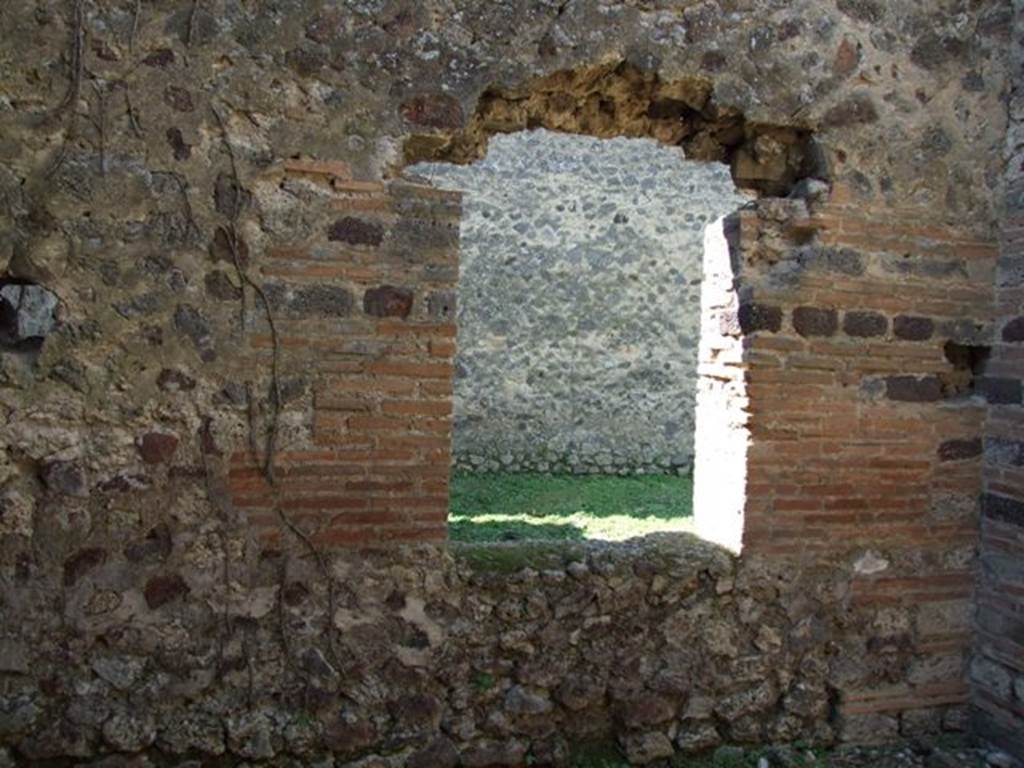 VI.15.5 Pompeii.  March 2009. Room 10.  West wall with window to garden area.