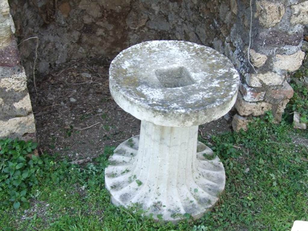 VI.15.5 Pompeii.  March 2009.  White marble base for a fountain.