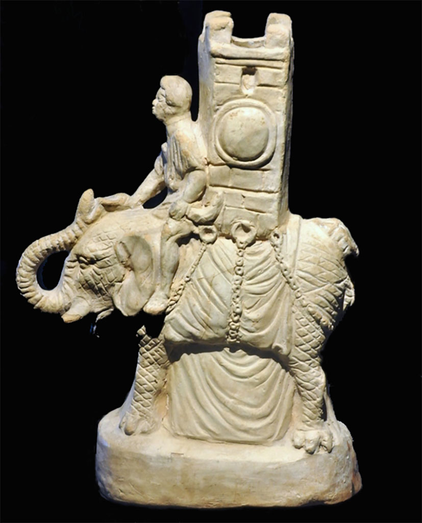 VI.15.5 Pompeii. April 2019. Statuette of Silenus, found on west side of garden near the aedicula.
Photo courtesy of Rick Bauer.
Now in Naples Archaeological Museum, inventory no. 124847.
Sala (room) 88, glass cabinet V, shelf C (top).
See Di Gioia, E. (2006). La ceramica invetriata in area vesuviana. “L’Erma” di Bretschneider, (p.122-23).

