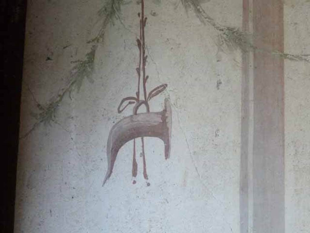 VI.15.8 Pompeii. May 2010. Detail from east wall of summer triclinium.