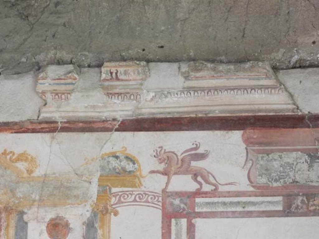 VI.15.8 Pompeii. May 2015. Detail of stucco on upper east side of centre of south wall. Photo courtesy of Buzz Ferebee.